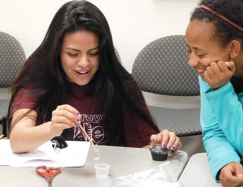 Students at High School Challenge testing bioplastic film