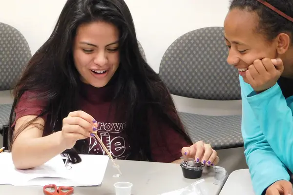 Students at High School Challenge testing bioplastic film